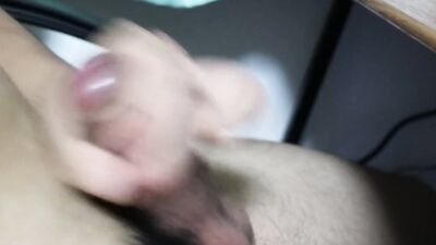 Amateur Asian chap is playing with a cock in this close-up video