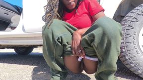 Ebony MILF Taking a Piss Next to the Road and Gets Hubby to Lick Her Pussy Clean After