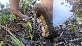 Wet and muddy high heels, high heels stuck in mud, wrecked shoes, wrecked high heels, high heels stuck in mud