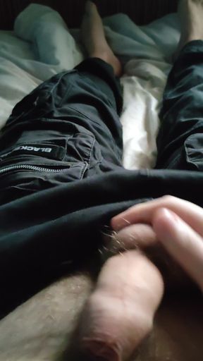 A young guy jerks off his sensitive penis in the morning