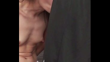 Candie Cross wears nothing but a tiny string as she rubs my hard bulge through my pants