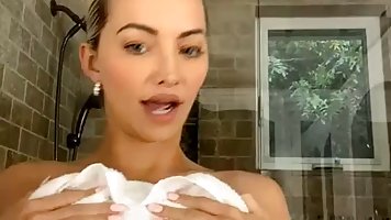 Lindsey Pelas, a smoking hot, blonde woman is often posing in front of the camera
