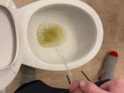 Taking a yellow piss while working on a house