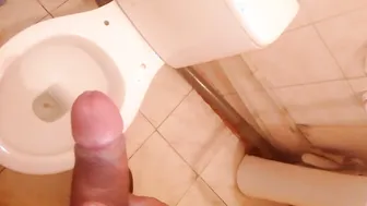 Young twink jerks his big cock in restroom and shoots cum