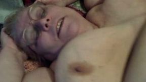 Sassy BBW four eyed granny lies in bed and cums hard for me