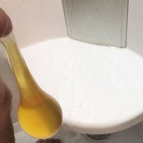 Huge piss in condom