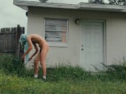 twink trimming the grass naked outside