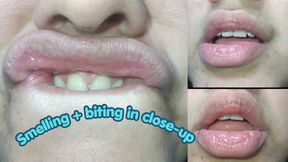 Smelling + biting my lips
