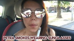 Petra smokes wearing sunglasses - HD