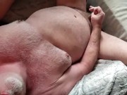 Bear gets cum on his feet and jerks off with a bbc in his mouth