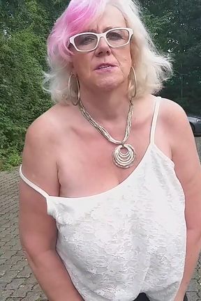 German Granny Plays with Her Favorite Sextoy Outdoors