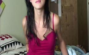 Brunette in Pink Dress Teases on Bed