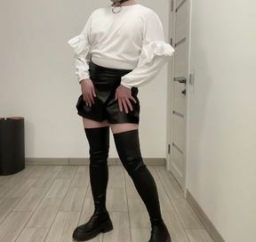 Sissy BDSM in leather shorts skirt and white office blouse