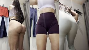 experimentando calcas de academia no provador do shopping e mostrando a bucetinha !