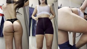 experimentando calcas de academia no provador do shopping e mostrando a bucetinha !