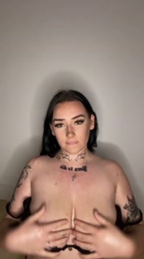British teen dirty talks whilst running her tits in massage oil