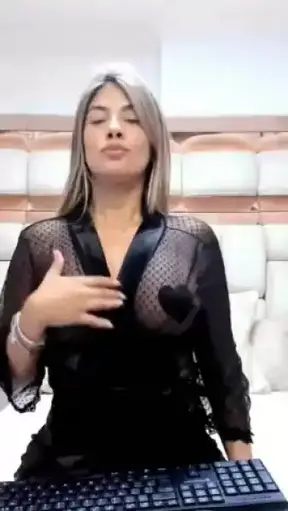 Watch this captivating short clip showcasing her alluring charm and playful moves.