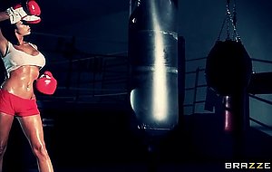 Boxer girl aryana augustine hitting the bag in the gym