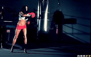 Boxer girl aryana augustine hitting the bag in the gym