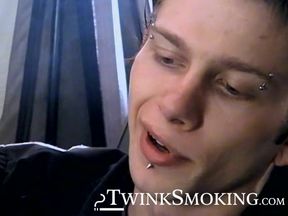 Attractive Ian Madrox is blowing smoke and starts stretching his cock in his smoky je