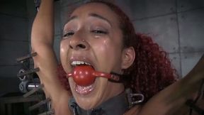 Slender moaning and titless ebony redhead gets fucked with some toys