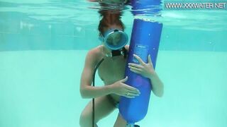 Hungarian pornstar Minnie Manga loving rides vibrator underwater