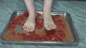 Domi smashes baby tomatoes with her feet