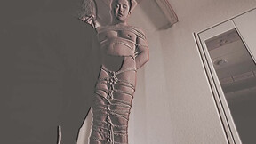 Japanese muscle hunk Kosuke is tied up by the notorious Shibari master Encho