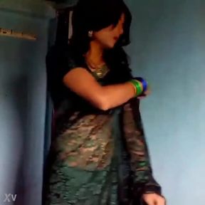 Crossdresser in green saree