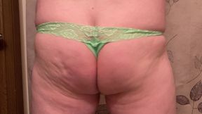 Sissy slut shakes her ass in green thong