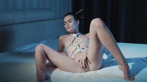 ”Kinky bondage sexy girl is all tied up as she masturbates avidly”