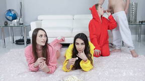 Enjoying movie, popcorn and cock in foursome