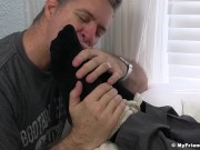 Aged yuppie Brendan Cage is restrained and foot worshipped