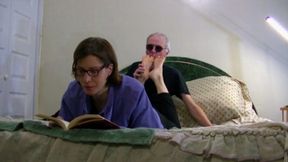 Anita reading in bed