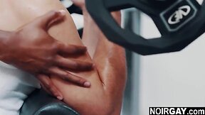 Interracial gay sex in the gym