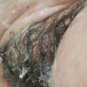 Stepmom washing her hairy pussy after fucking a lot of water got into her vagina