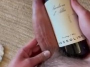Comparing my big cock to a wine bottle