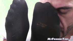 ”Man with beard tied up as his master licks his toes”