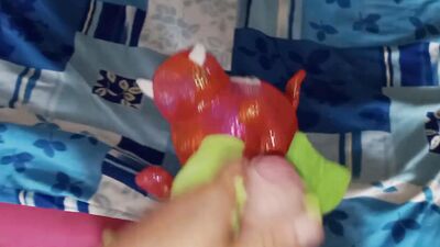 Perverted bloke is rubbing his pecker on a favorite dragon toy