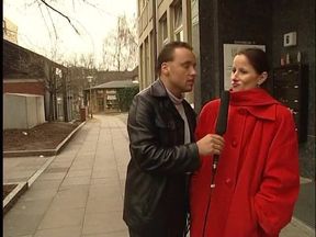 Brunette german lady interviewed outdoors