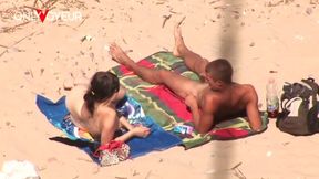 voyeur filmed beach girl stroking boyfriend’s dick and taking cum on small tits