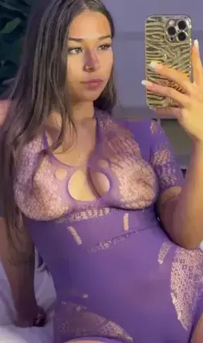 Mirror selfie in my sheer purple bodysuit