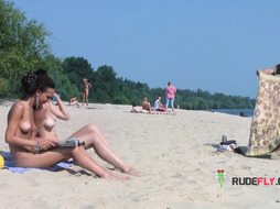 Skinny and young nudist chicks fool around