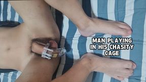 Man Playing in His Chasity Cage