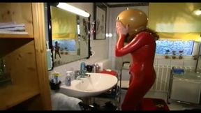 Sexual Slave in Latex Dress and a Grotesque Mask Is Waiting for a Punishment