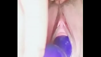 Girl removing kegel from pussy