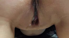 Sperm flows out of a milf's pussy with squirt