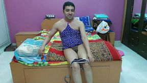 Sexy sissy crossdresser femboy Sweet Lollipop in a tank top and thong.