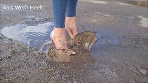 Playing in Puddles Wearing my Louboutin So Kate Patent Stilettos