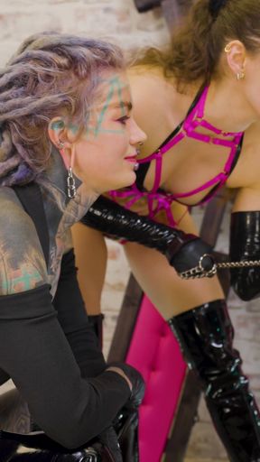 Emotional moment from "Tattooed Babes Take Control in Strap-On"